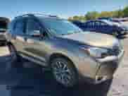 2018 Subaru Forester Touring z VIN JF2SJGWC8JH511119, wystawiony jako Copart lot #80750065 z przebiegiem 86 471 mil mil oraz Szkoda całkowita • Salvage title. Historia ofert i sprzedaży dostępna na DreamBid. Obrazek 4.