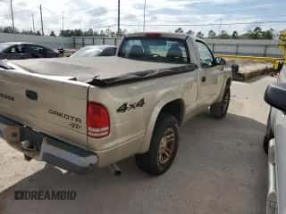 2004 Dodge Dakota z VIN 1D7GG16K94S622234, wystawiony jako Copart lot #79830354 z przebiegiem 63 401 mil mil oraz Szkoda całkowita • Salvage title. Historia ofert i sprzedaży dostępna na DreamBid. Obrazek 3.