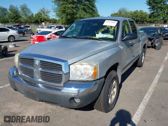✅ 2005 Dodge Dakota SLT • VIN: 1D7HW48N05S177433 • Lot: 43024048. Listed on IAAI with 141,066 mi. Free auction sales archive from the USA and detailed vehicle history report at DreamBid. Image 2.