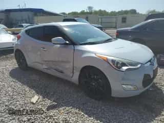 2015 Hyundai Veloster z VIN KMHTC6AD9FU223479, wystawiony jako Copart lot #67728954 z przebiegiem 110 504 mil mil oraz Szkoda całkowita • Salvage title. Historia ofert i sprzedaży dostępna na DreamBid. Obrazek 4.