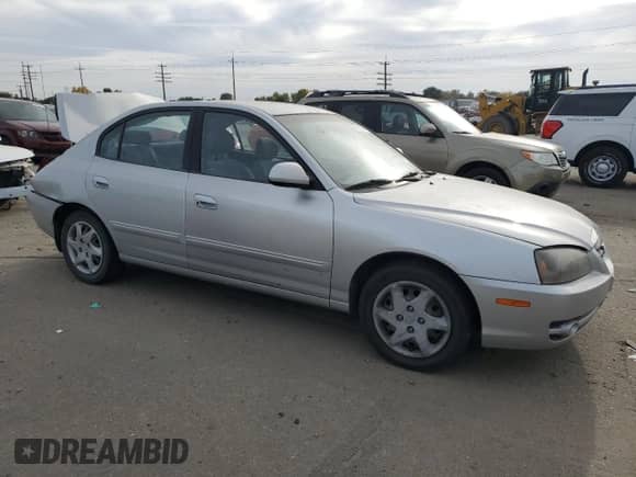 2005 Hyundai Elantra GLS z VIN KMHDN46D75U115937, wystawiony jako Copart lot #77410514 z przebiegiem 128 015 mil mil oraz Szkoda całkowita • Salvage title. Historia ofert i sprzedaży dostępna na DreamBid. Obrazek 4.