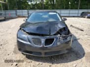 ✅ 2007 Pontiac G6 G6 • VIN: 1G2ZG58B074256071 • Lot: 67842985. Wystawiony na Copart z przebiegiem 202 893 mil. Bezpłatny archiwum sprzedaży aukcyjnych z USA i szczegółowy raport historii pojazdu na DreamBid. Zdjęcie 5.