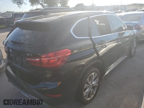 ✅ 2018 BMW X1 xDrive28i • VIN: WBXHT3C37J5K27694 • Lot: 64022772. Listed on Copart with 59,413 mi. Free auction sales archive from the USA and detailed vehicle history report at DreamBid. Image 4.