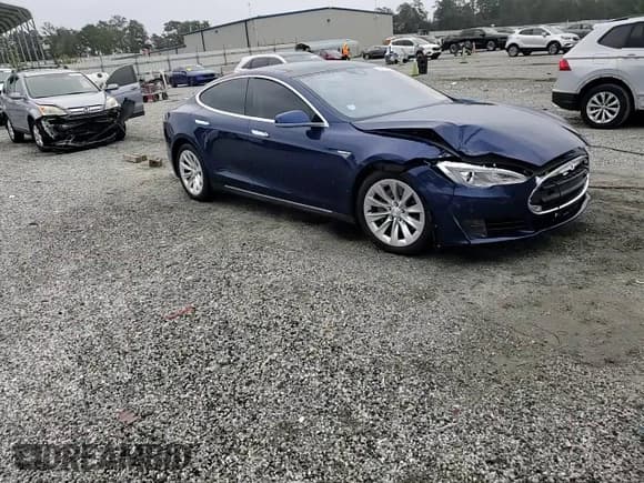 ✅ 2015 Tesla Model S 85D • VIN: 5YJSA1S26FF090047 • Лот: 84451495. Опубликован ранее на Copart с пробегом 128 047 миль. Бесплатный доступ к архиву аукционных продаж из США и подробный отчёт об истории автомобиля на DreamBid. Изображение 14.