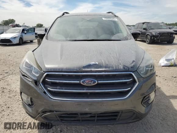 2018 Ford Escape SE z VIN 1FMCU9GD6JUD48647, wystawiony jako Copart lot #70868345 z przebiegiem 102 072 mil mil oraz Szkoda całkowita • Salvage title. Historia ofert i sprzedaży dostępna na DreamBid. Obrazek 5.