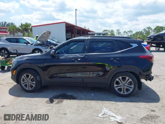 ✅ 2023 Kia Seltos S • VIN: KNDEU2AA4P7371547 • Lot: 42242913. Listed on IAAI with 35,374 mi. Free auction sales archive from the USA and detailed vehicle history report at DreamBid. Image 14.