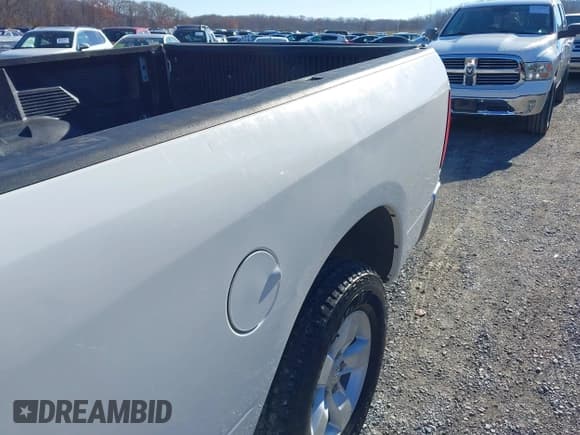 ✅ 2020 Ram 1500 Tradesman • VIN: 3C6JR7DT8LG211199 • Lot: 43766734. Listed on IAAI with 122,403 mi. Free auction sales archive from the USA and detailed vehicle history report at DreamBid. Image 12.