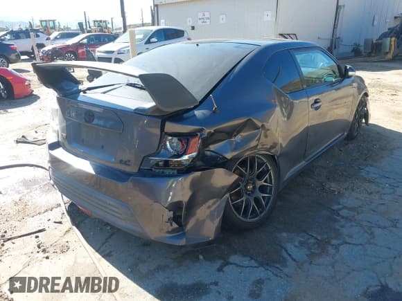 ✅ 2016 Scion tC • VIN: JTKJF5C77GJ019649 • Лот: 43781975. Опубликован ранее на IAAI с пробегом 117 412 миль. Бесплатный доступ к архиву аукционных продаж из США и подробный отчёт об истории автомобиля на DreamBid. Изображение 4.