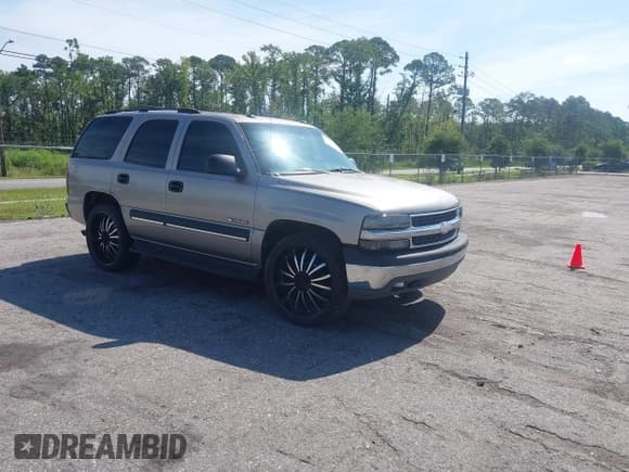 ✅ 2003 Chevrolet Tahoe LT • VIN: 1GNEC13Z13R236967 • Lot: 42541249. Wystawiony na IAAI z przebiegiem 305 448 mil. Bezpłatny archiwum sprzedaży aukcyjnych z USA i szczegółowy raport historii pojazdu na DreamBid. Zdjęcie 1.