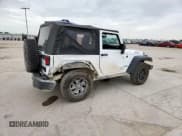 ✅ 2016 Jeep Wrangler Black Bear • VIN: 1C4AJWAG0GL104173 • Lot: 63565415. Wystawiony na Copart z przebiegiem 52 922 mil. Bezpłatny archiwum sprzedaży aukcyjnych z USA i szczegółowy raport historii pojazdu na DreamBid. Zdjęcie 3.