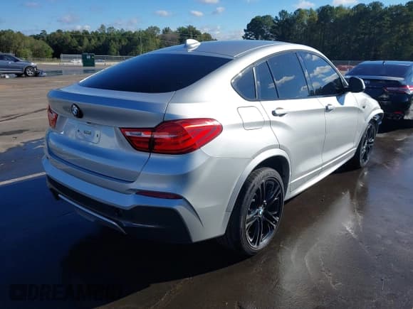 ✅ 2016 BMW X4 xDrive28i • VIN: 5UXXW3C5XG0R22760 • Lot: 43443983. Listed on IAAI with 162,224 mi. Free auction sales archive from the USA and detailed vehicle history report at DreamBid. Image 4.