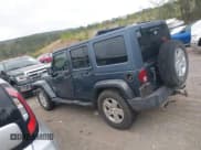 ✅ 2007 Jeep Wrangler Unlimited Sahara • VIN: 1J4GB59197L200251 • Lot: 41801513. Listed on IAAI with 200,612 mi. Free auction sales archive from the USA and detailed vehicle history report at DreamBid. Image 14.