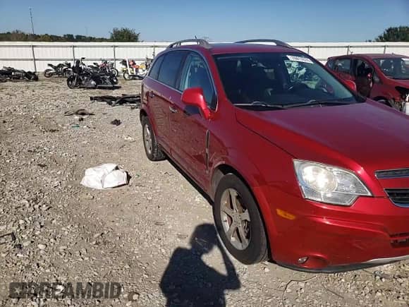2014 Chevrolet Captiva Sport LT z VIN 3GNAL3EK2ES541243, wystawiony jako Copart lot #74417674 z przebiegiem 142 501 mil mil oraz Szkoda całkowita • Salvage title. Historia ofert i sprzedaży dostępna na DreamBid. Obrazek 12.
