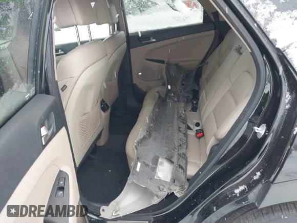 2018 Hyundai Tucson Limited with VIN KM8J33A25JU719215, listed as a IAAI auction lot 41304125 with 118,429 mi miles and . Bid and sale history available at DreamBid. Image 12.