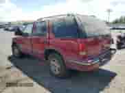 1999 Chevrolet Blazer LS z VIN 1GNDT13W2X2157694, wystawiony jako Copart lot #63347804 z przebiegiem Nie podano mil oraz Szkoda całkowita • Salvage title. Historia ofert i sprzedaży dostępna na DreamBid. Obrazek 2.