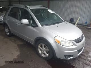 ✅ 2009 Suzuki SX4 Touring AWD • VIN: JS2YB417896200835 • Lot: 42646630. Wystawiony na IAAI z przebiegiem 145 068 mil. Bezpłatny archiwum sprzedaży aukcyjnych z USA i szczegółowy raport historii pojazdu na DreamBid. Zdjęcie 1.