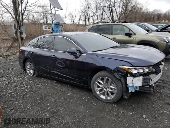 ✅ 2022 Toyota Avalon Hybrid XLE • VIN: 4T1AA1ABXNU015690 • Лот: 49487015. Опубликован ранее на Copart с пробегом 13 672 миль. Бесплатный доступ к архиву аукционных продаж из США и подробный отчёт об истории автомобиля на DreamBid. Изображение 4.