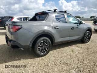 2023 Hyundai Santa Cruz SEL Premium z VIN 5NTJDDAF8PH047066, wystawiony jako Copart lot #73642744 z przebiegiem Nie podano mil oraz Szkoda całkowita • Salvage title. Historia ofert i sprzedaży dostępna na DreamBid. Obrazek 3.