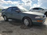 ✅ 1995 Chevrolet Prizm • VIN: 1Y1SK5282SZ017458 • Lot: 80265735. Listed on Copart with 260,827 mi. Free auction sales archive from the USA and detailed vehicle history report at DreamBid. Image 4.