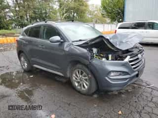 2018 Hyundai Tucson SEL Plus with VIN KM8J3CA40JU621209, listed as a Copart auction lot 84704305 with 100,360 mi miles and Salvage title. Bid and sale history available at DreamBid. Image 4.