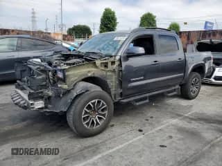 2022 Toyota Tacoma SR5 с VIN 3TMAZ5CN5NM181034, выставлен на аукционе Copart как лот 66614255 с пробегом 41 176 миль миль и На запчасти • Non repairable. История ставок и продаж доступна на DreamBid. Изображение 1.