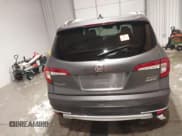 ✅ 2021 Honda Pilot Touring 8-Passenger • VIN: 5FNYF6H99MB028751 • Лот: 41226814. Опубликован ранее на IAAI с пробегом Не указан. Бесплатный доступ к архиву аукционных продаж из США и подробный отчёт об истории автомобиля на DreamBid. Изображение 15.