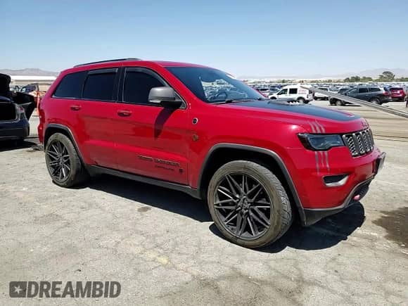 2019 Jeep Grand Cherokee Trailhawk с VIN 1C4RJFLT4KC787940, выставлен на аукционе Copart как лот 60883895 с пробегом 77 160 миль миль и Списание • Salvage title. История ставок и продаж доступна на DreamBid. Изображение 14.