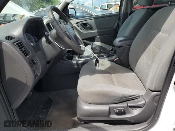 ✅ 2006 Ford Escape Hybrid • VIN: 1FMYU96H46KD56176 • Lot: 68761805. Wystawiony na Copart z przebiegiem 138 396 mil. Bezpłatny archiwum sprzedaży aukcyjnych z USA i szczegółowy raport historii pojazdu na DreamBid. Zdjęcie 7.