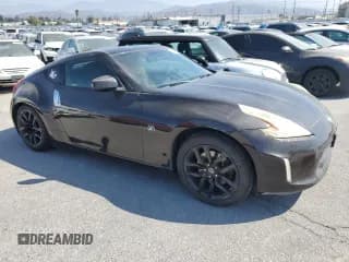 ✅ 2013 Nissan 370Z • VIN: JN1AZ4EH6DM380169 • Lot: 84571055. Wystawiony na Copart z przebiegiem 162 493 mil. Bezpłatny archiwum sprzedaży aukcyjnych z USA i szczegółowy raport historii pojazdu na DreamBid. Zdjęcie 4.