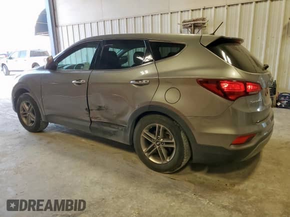 2018 Hyundai Santa Fe 2.4L with VIN 5NMZT3LB0JH081208, listed as a Copart auction lot 71311505 with 147,017 mi miles and Salvage title. Bid and sale history available at DreamBid. Image 2.