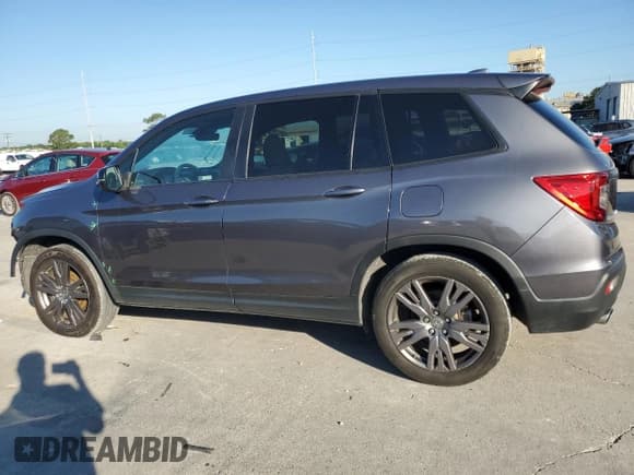 ✅ 2021 Honda Passport EX-L • VIN: 5FNYF7H56MB003423 • Lot: 55994525. Listed on Copart with 50,905 mi. Free auction sales archive from the USA and detailed vehicle history report at DreamBid. Image 2.