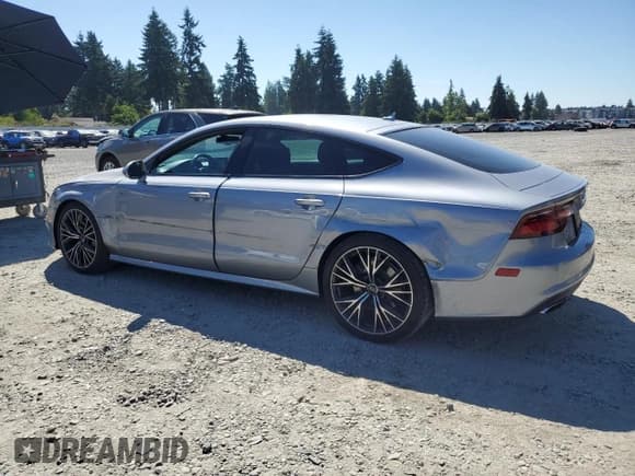 ✅ 2017 Audi A7 Premium Plus • VIN: WAUW2AFCXHN120945 • Лот: 66336185. Опубликован ранее на Copart с пробегом 82 847 миль. Бесплатный доступ к архиву аукционных продаж из США и подробный отчёт об истории автомобиля на DreamBid. Изображение 2.
