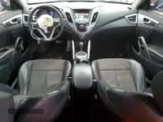 ✅ 2013 Hyundai Veloster w/Black Int • VIN: KMHTC6AD2DU121339 • Lot: 86772194. Wystawiony na Copart z przebiegiem 117 376 mil. Bezpłatny archiwum sprzedaży aukcyjnych z USA i szczegółowy raport historii pojazdu na DreamBid. Zdjęcie 8.