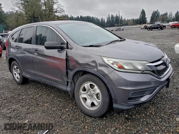 ✅ 2015 Honda CR-V LX • VIN: 2HKRM4H36FH617576 • Lot: 94724275. Listed on Copart with 92,775 mi. Free auction sales archive from the USA and detailed vehicle history report at DreamBid. Image 4.