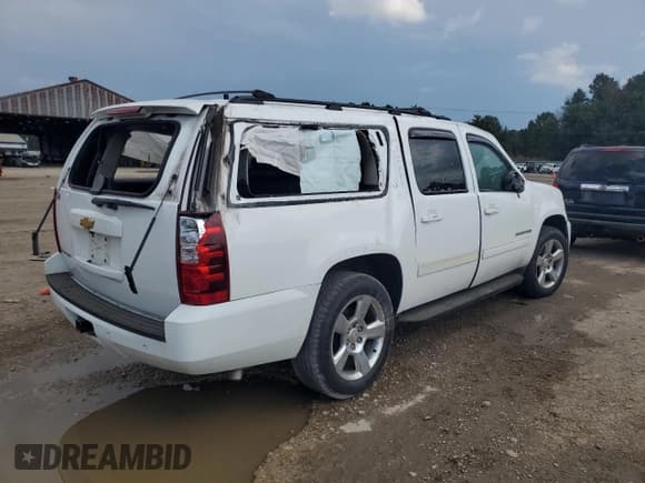 ✅ 2014 Chevrolet Suburban LT • VIN: 1GNSCJE0XER236440 • Lot: 69927065. Listed on Copart with Not provided. Free auction sales archive from the USA and detailed vehicle history report at DreamBid. Image 3.