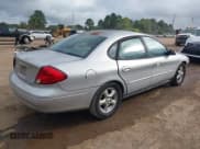 ✅ 2003 Ford Taurus SE Standard • VIN: 1FAFP53U43A119272 • Lot: 43269838. Listed on IAAI with 168,335 mi. Free auction sales archive from the USA and detailed vehicle history report at DreamBid. Image 4.