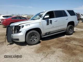 2020 Chevrolet Tahoe Commercial z VIN 1GNLCDEC1LR158059, wystawiony jako Copart lot #68873815 z przebiegiem Nie podano mil oraz Szkoda całkowita • Salvage title. Historia ofert i sprzedaży dostępna na DreamBid. Obrazek 1.