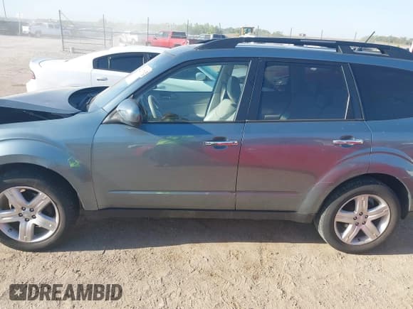 ✅ 2009 Subaru Forester X Limited • VIN: JF2SH64629H744847 • Lot: 42231778. Listed on IAAI with 172,139 mi. Free auction sales archive from the USA and detailed vehicle history report at DreamBid. Image 14.