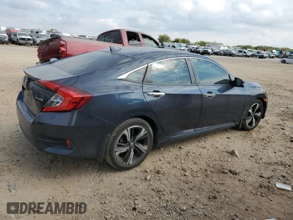 ✅ 2017 Honda Civic Touring • VIN: 19XFC1F97HE002599 • Lot: 86194955. Listed on Copart with 63,600 mi. Free auction sales archive from the USA and detailed vehicle history report at DreamBid. Image 3.