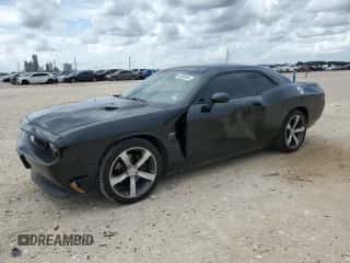 2014 Dodge Challenger SXT 100th Anniversary z VIN 2C3CDYAG0EH224856, wystawiony jako Copart lot #64550644 z przebiegiem 88 391 mil mil oraz Szkoda całkowita • Salvage title. Historia ofert i sprzedaży dostępna na DreamBid. Obrazek 1.