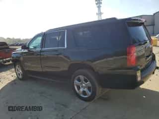 2020 Chevrolet Suburban LS z VIN 1GNSKGKC1LR279629, wystawiony jako Copart lot #80777405 z przebiegiem 95 401 mil mil oraz Szkoda całkowita • Salvage title. Historia ofert i sprzedaży dostępna na DreamBid. Obrazek 2.