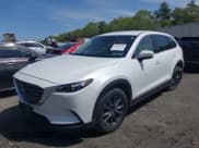 ✅ 2021 Mazda CX-9 Touring • VIN: JM3TCBCYXM0521323 • Lot: 42190976. Listed on IAAI with 56,652 mi. Free auction sales archive from the USA and detailed vehicle history report at DreamBid. Image 2.