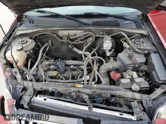 2011 Mercury Mariner z VIN 4M2CN8B77BKJ04820, wystawiony jako Copart lot #77322383 z przebiegiem Nie podano mil oraz Szkoda całkowita • Salvage title. Historia ofert i sprzedaży dostępna na DreamBid. Obrazek 12.