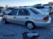 ✅ 2000 Toyota Corolla CE • VIN: 1NXBR12E2YZ392203 • Лот: 90441485. Опубликован ранее на Copart с пробегом Не указан. Бесплатный доступ к архиву аукционных продаж из США и подробный отчёт об истории автомобиля на DreamBid. Изображение 2.