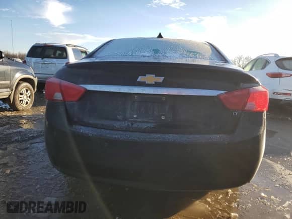 2014 Chevrolet Impala LT с VIN 2G1125S34E9117914, выставлен на аукционе Copart как лот 81042053 с пробегом 188 185 миль миль и Списание • Salvage title. История ставок и продаж доступна на DreamBid. Изображение 6.