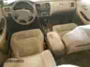 2001 Honda Accord EX с VIN 1HGCG56611A002676, выставлен на аукционе Copart как лот 82362775 с пробегом 233 125 миль миль и Списание • Salvage title. История ставок и продаж доступна на DreamBid. Изображение 8.