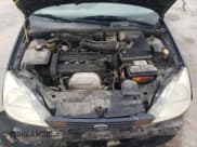 ✅ 2002 Ford Focus SE • VIN: 1FAFP34342W350331 • Lot: 57230435. Listed on Copart with 222,136 mi. Free auction sales archive from the USA and detailed vehicle history report at DreamBid. Image 11.