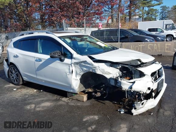 ✅ 2018 Subaru Impreza Limited • VIN: 4S3GTAU63J3729605 • Lot: 43709334. Listed on IAAI with 101,943 mi. Free auction sales archive from the USA and detailed vehicle history report at DreamBid. Image 1.