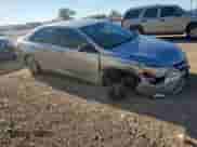 2015 Toyota Camry LE with VIN 4T4BF1FK4FR467561, listed as a Copart auction lot 90633485 with 183,799 mi miles and Clean title. Bid and sale history available at DreamBid. Image 4.