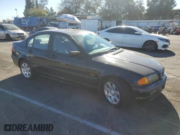 1999 BMW 3 Series 323i с VIN WBAAM3331XKC56081, выставлен на аукционе Copart как лот 82767554 с пробегом 92 916 миль миль и Списание • Salvage title. История ставок и продаж доступна на DreamBid. Изображение 4.